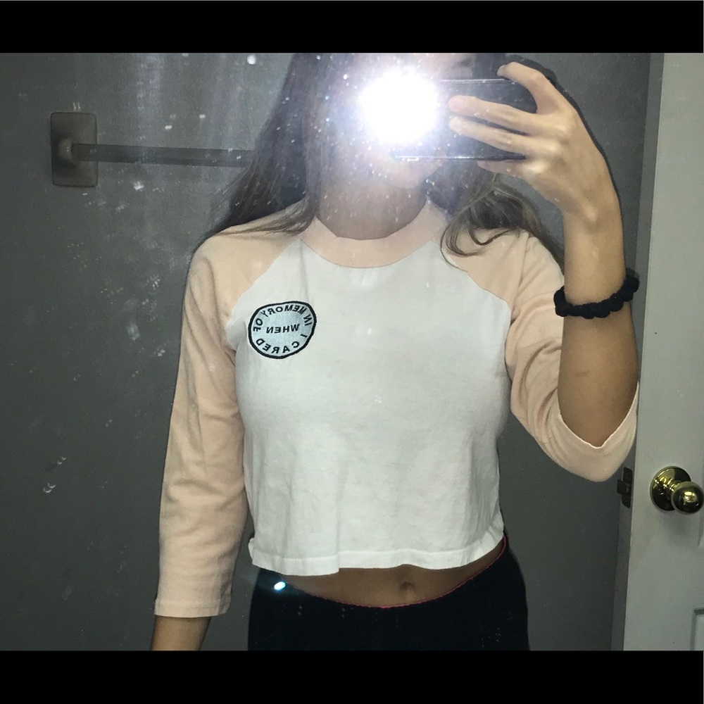 Pink and white cropped top with a blue circle